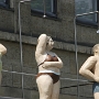 Bewacht vom Bademeister räkeln sich die dicklichen Figuren in Bikini und Badeanzug unter den Duschen am Richard Balz Haus.<br />25.5.2010