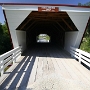 Cedar Covered Bridge<br />Erbaut 1883 von H.P. Jones, ursprünglich am Cedar Creek, nördlich von Winterset. 1921 zum jetzigen Standort umgesetzt.