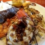 30.9.2016<br />Wood-Grilled Lobster, Shrimp and Salmon im Red Lobster, Las Vegas/NV<br />A Maine lobster tail, jumbo shrimp skewer and fresh Atlantic salmon, all wood-grilled and finished with brown butter. Served with rice and a choice of side.