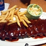 10.2.2017<br />Baby Back Ribs bei TGI Fridays im Miami Airport - D36<br />Slow-cooked, fall-off-the-bone tender baby back pork<br />ribs basted in Tennessee BBQ sauce then fire-grilled.<br />Served with seasoned fries and coleslaw.