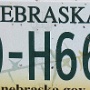 Der Name Nebraska stammt von einem indianischen Wort mit der Bedeutung „flaches Wasser“. Der Name rührt vom Platte River, der durch den Staat fließt.License Plate Nebraska