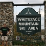 In der Stadt Wilmington, etwa 21 km vom Lake Placid entfernt, befindet sich am Osthang des Berges ein großes Skigebiet, in dem die alpinen Skiwettbewerbe der Olympischen Winterspiele 1980 ausgetragen wurden.<br /><br />Am 3.10.2007 vor dem Schild gestanden.