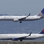 Delta Air Lines - Boeing 737-932ER (WL) - N930DZ<br />United Airlines - Boeing 737-924(ER) - N36447<br />SFO - Bayfront Park - 13.5.2022 - 2:49 PM<br />
