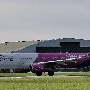 Wizz Air - Airbus A321-231(WL) - HA-LXI<br />OSL - 19.7.2023 - Comfort Inn Runway Hotel Area - 9:35