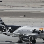 Allegiant Air - Airbus A319-1 - N328NV - "Las Vegas Raiders" special colours<br />LAS - Terminal 1 Parkhausdach - 3.5.2022 - 2:11 PM