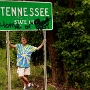 Tennessee State Line - leicht verschandeltes Schild am Highway 72, nach Sewanee fahrend.<br />31.7.2007